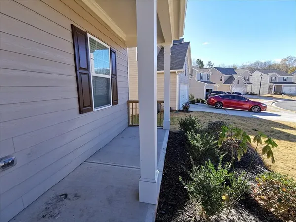 a view of swimming pool with outdoor seating