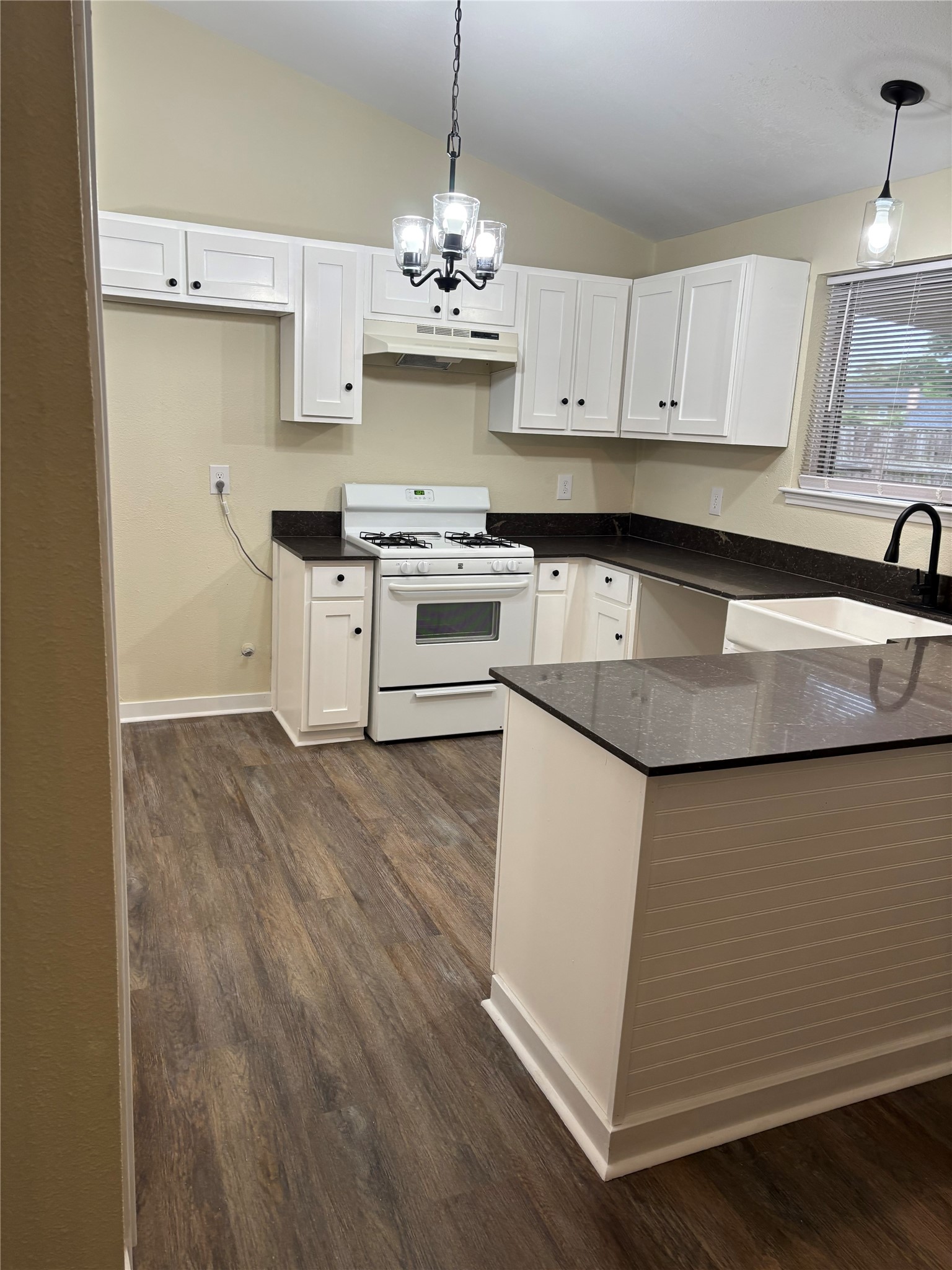 23726 Farm Hill Drive Spring, TX 77373 - Photo 3 of 11 a kitchen with stainless steel appliances granite countertop a sink dishwasher a stove and a refrigerator