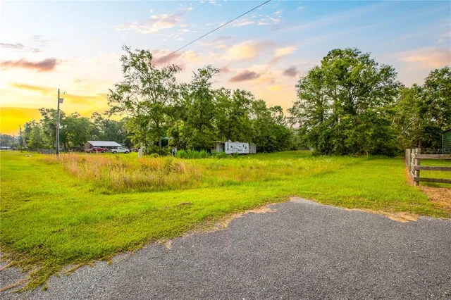 a view of a lake with a big yard