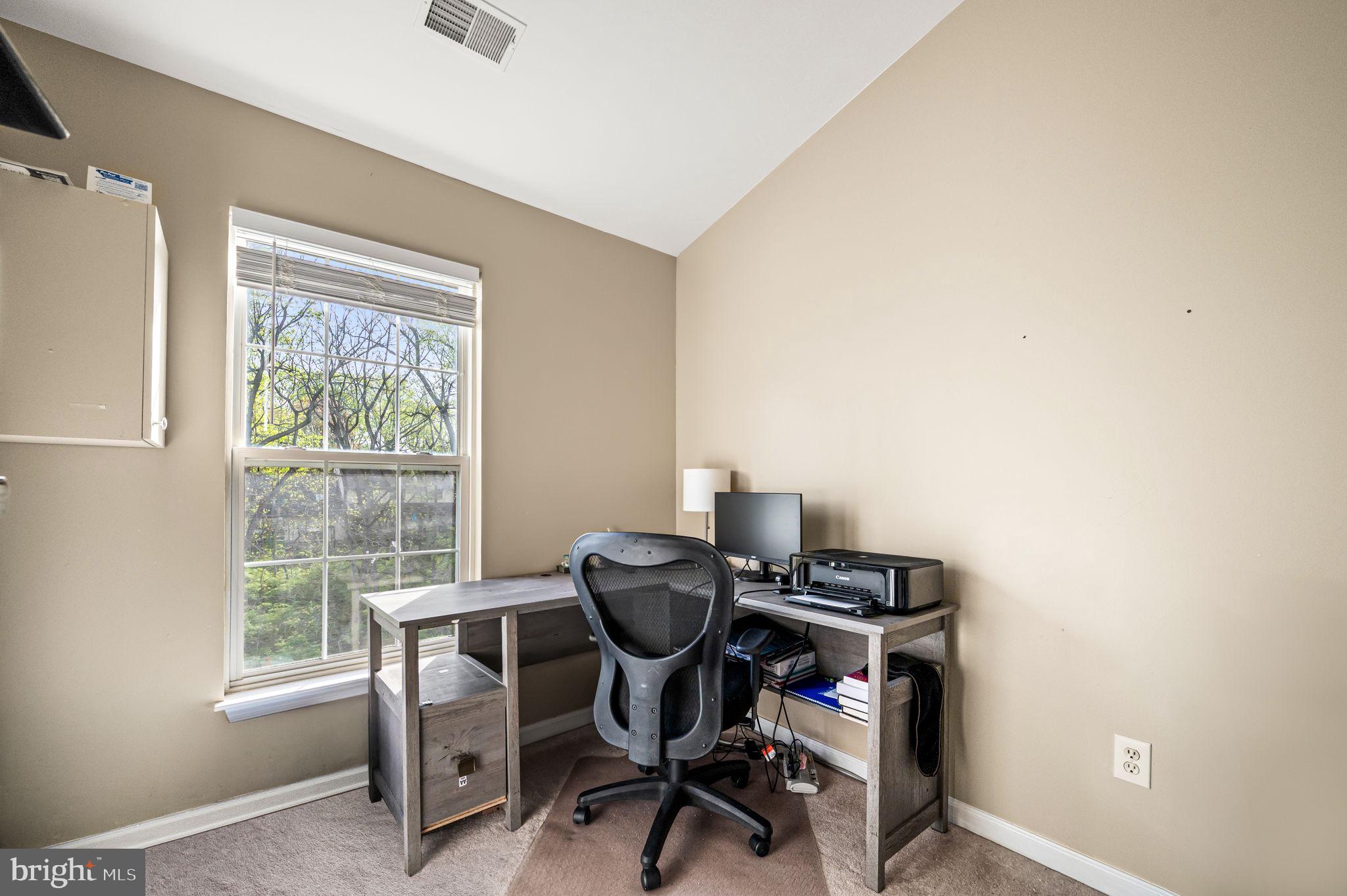 588 Coach Hill Court West Chester, PA 19380 - Photo 13 of 18 a view of a workspace with furniture and a window