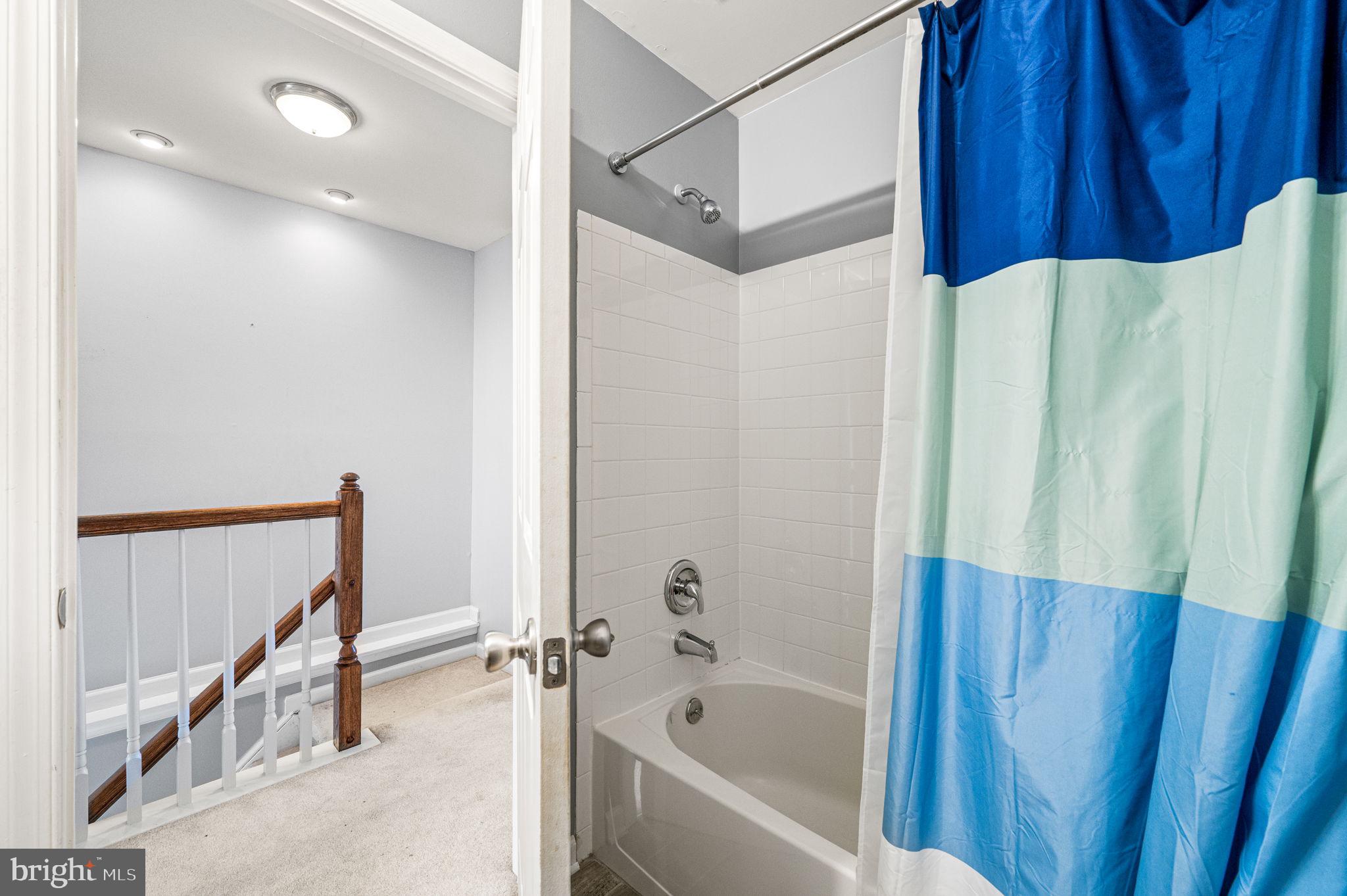 588 Coach Hill Court West Chester, PA 19380 - Photo 15 of 18 a bathroom with a bathtub and a shower