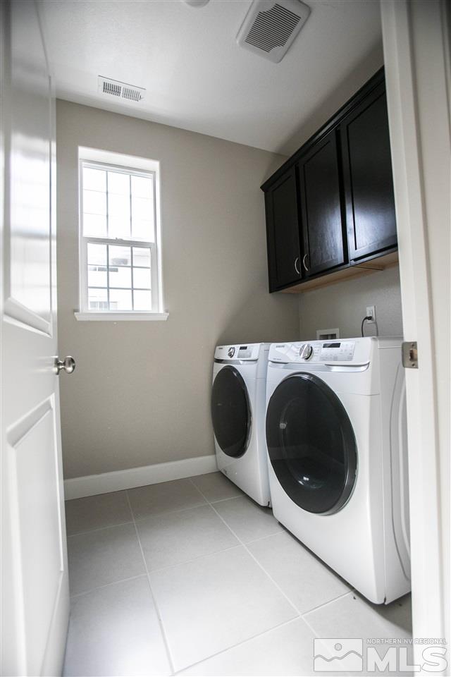 1856 Sea Horse Road, Unit A Reno, NV 89521 - Photo 16 of 16 a utility room with sink dryer and washer