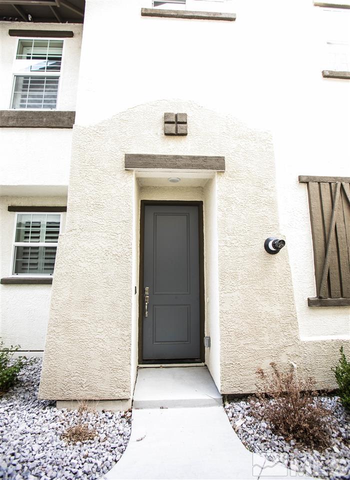 1856 Sea Horse Road, Unit A Reno, NV 89521 - Photo 3 of 16 a view of front door of house