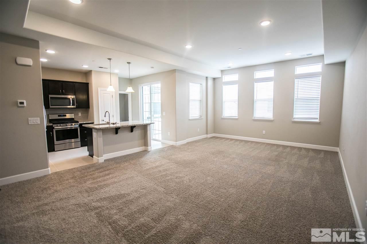 1856 Sea Horse Road, Unit A Reno, NV 89521 - Photo 9 of 16 a view of an empty room with a window