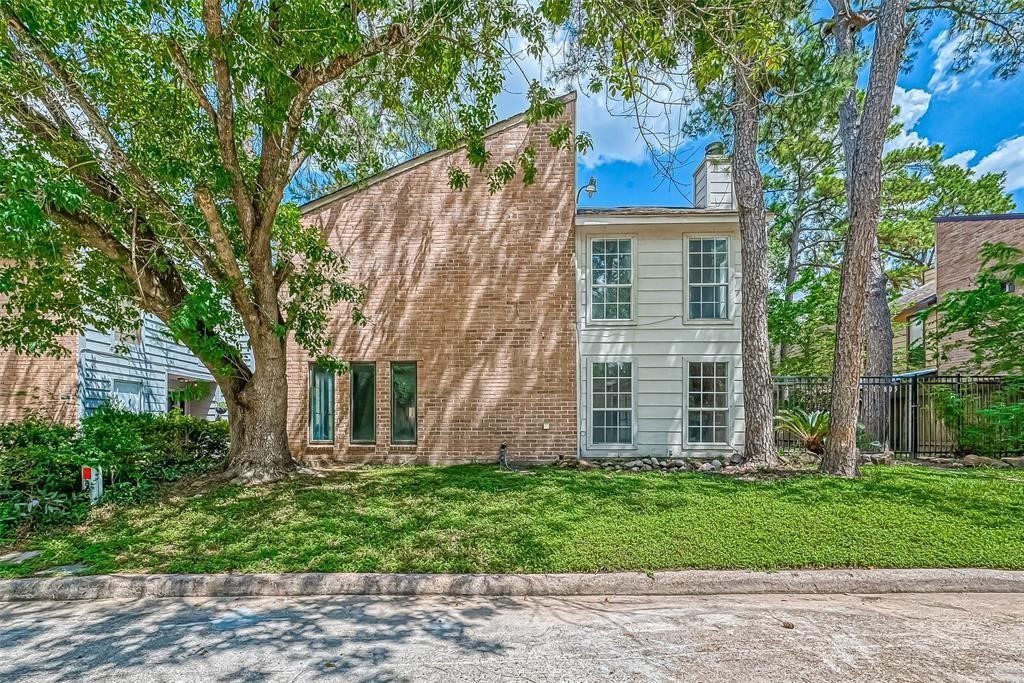 17805 Villa Way Drive Spring, TX 77379 - Photo 2 of 50 front view of a house with a garden