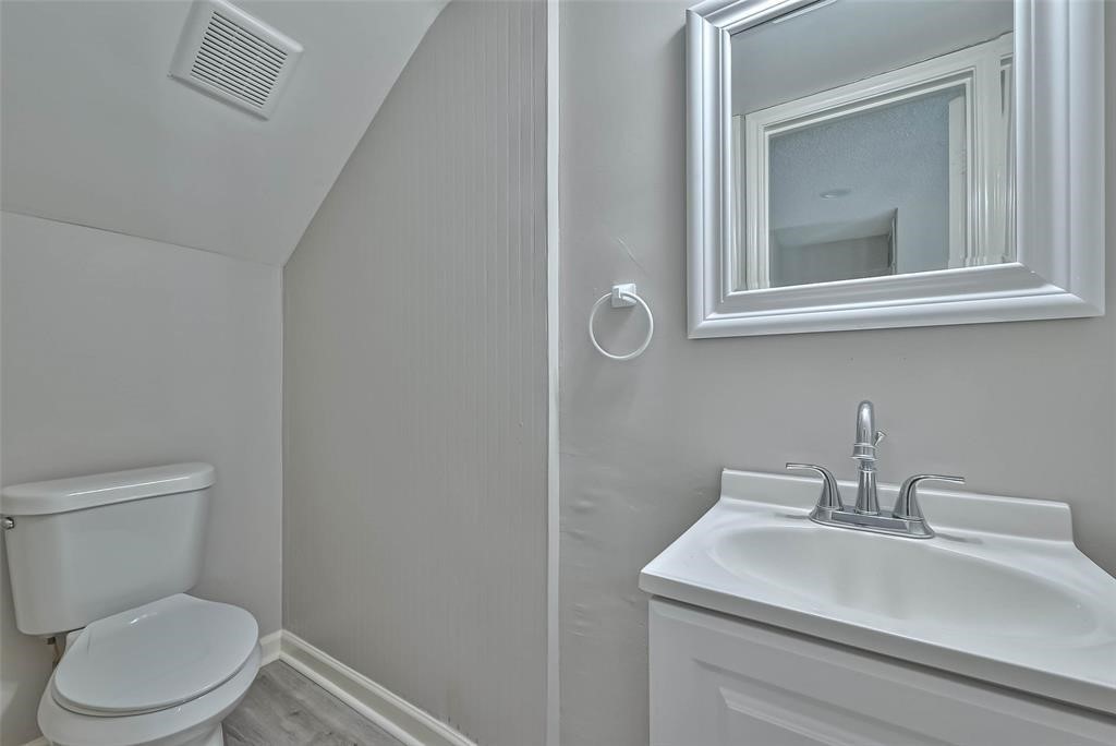 17805 Villa Way Drive Spring, TX 77379 - Photo 41 of 50 a bathroom with a sink a toilet and mirror