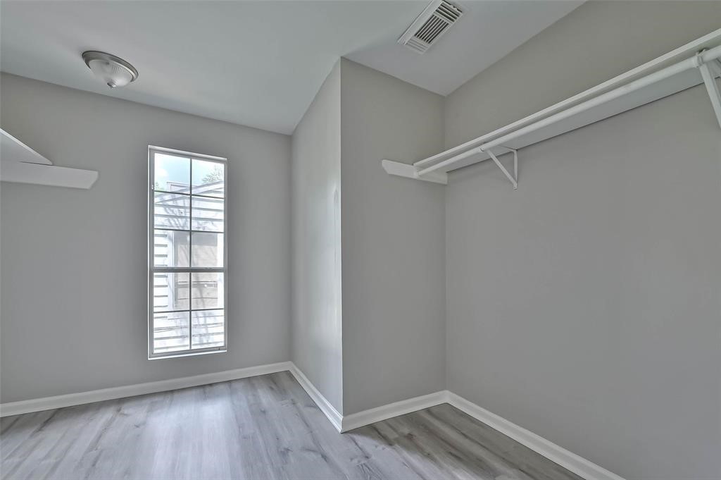 17805 Villa Way Drive Spring, TX 77379 - Photo 50 of 50 a view of an empty room with wooden floor and a window
