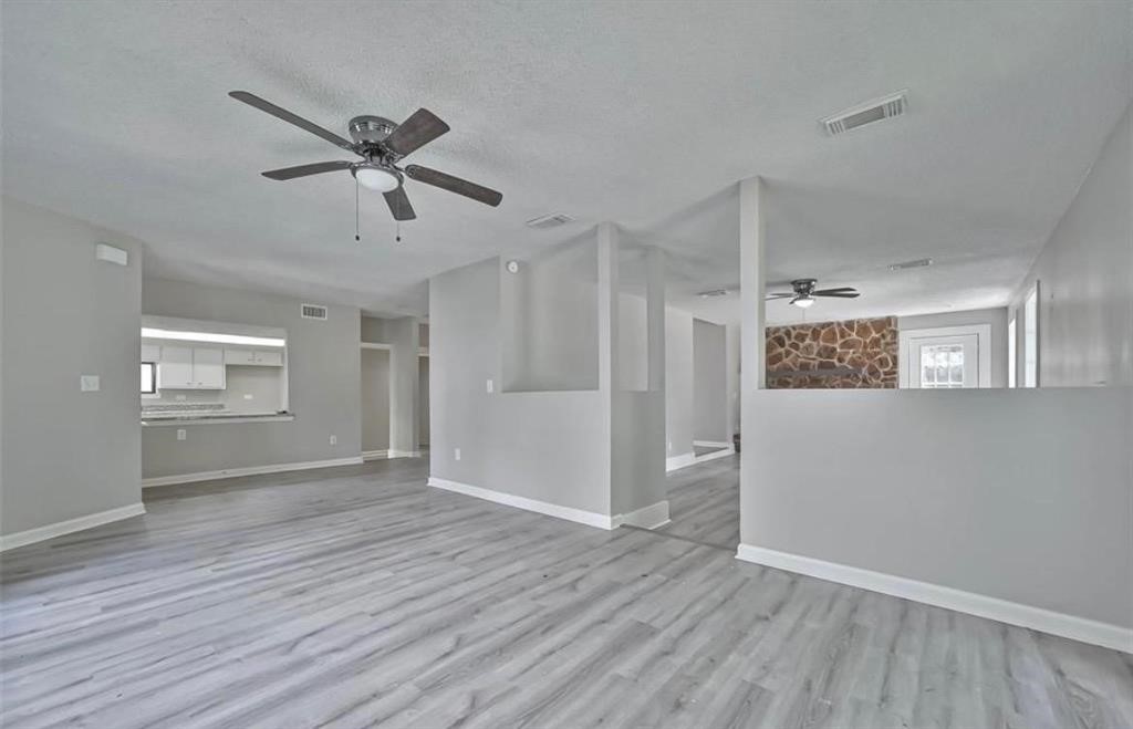 17805 Villa Way Drive Spring, TX 77379 - Photo 8 of 50 a view of an empty room and wooden floor