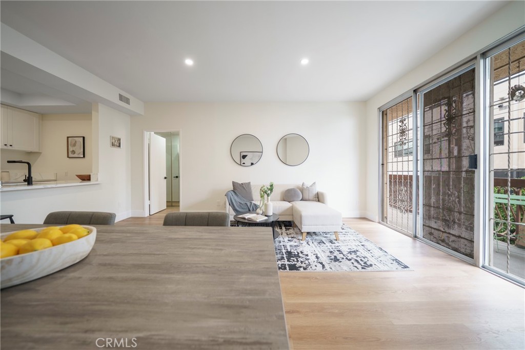 104 South Hayworth Avenue, Unit 204 Los Angeles, CA 90048 - Photo 2 of 52 a living room with furniture
