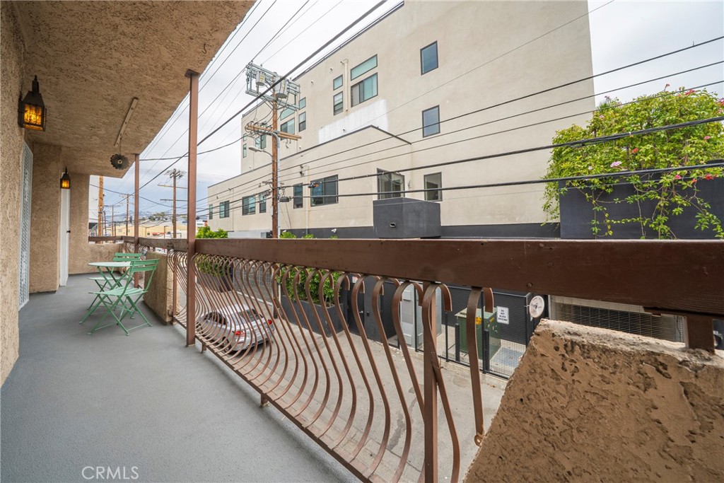 104 South Hayworth Avenue, Unit 204 Los Angeles, CA 90048 - Photo 24 of 52 a view of a balcony with chairs