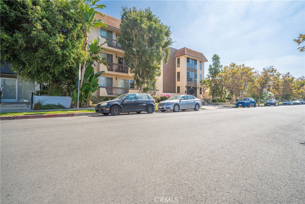 104 South Hayworth Avenue, Unit 204 Los Angeles, CA 90048 - Photo 29 of 52 a view of a street with houses