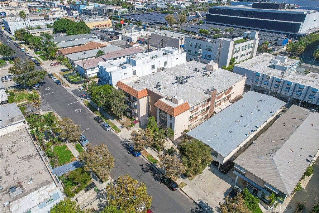 104 South Hayworth Avenue, Unit 204 Los Angeles, CA 90048 - Photo 42 of 52 an aerial view of a house with a yard and lake view