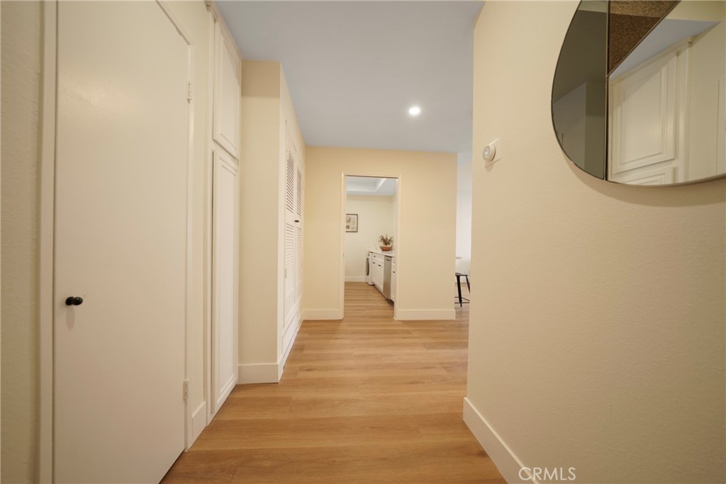 104 South Hayworth Avenue, Unit 204 Los Angeles, CA 90048 - Photo 9 of 52 a view of a room with wooden floor and entryway