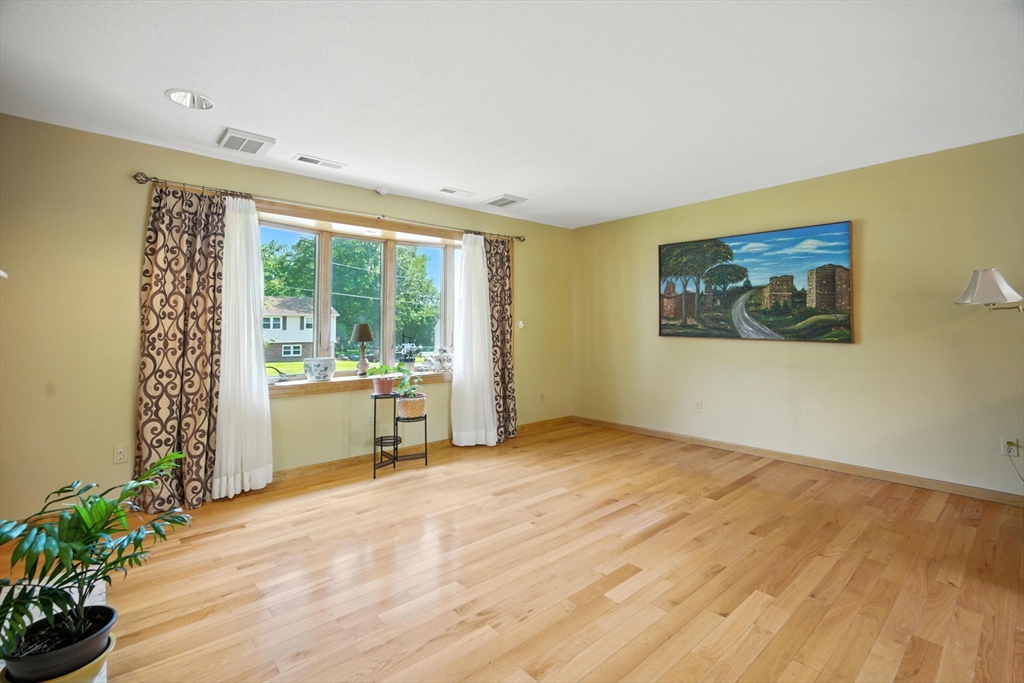 22 Woodland Road Springfield, MA 01129 - Photo 15 of 36 a view of an empty room with a window