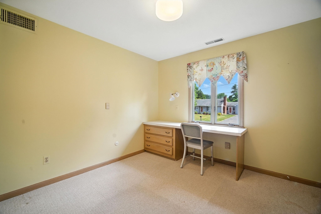 22 Woodland Road Springfield, MA 01129 - Photo 16 of 36 a room with furniture and window