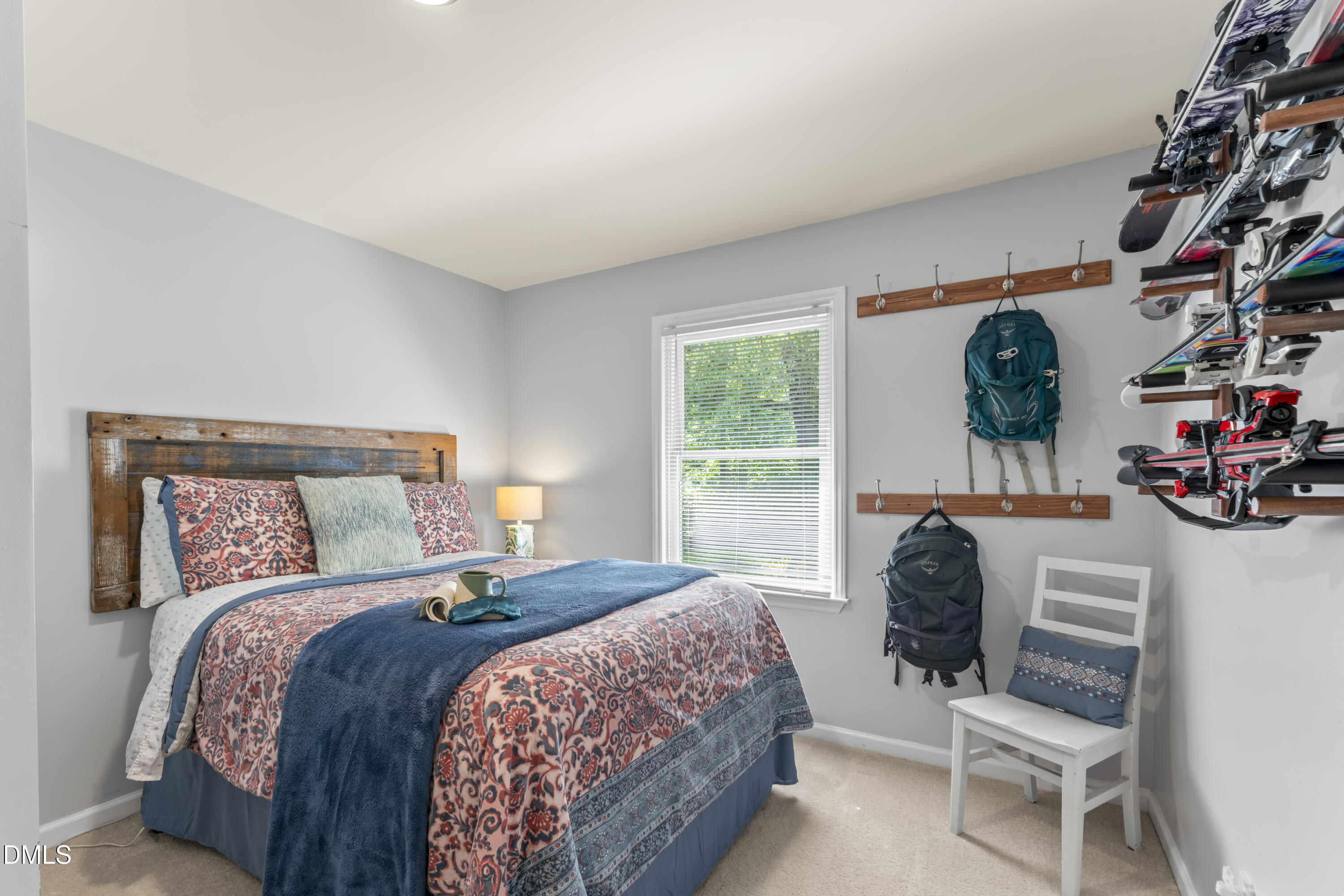 3419 Old Chapel Hill Road Durham, NC 27707 - Photo 24 of 38 a bedroom with a bed a chair and a large window