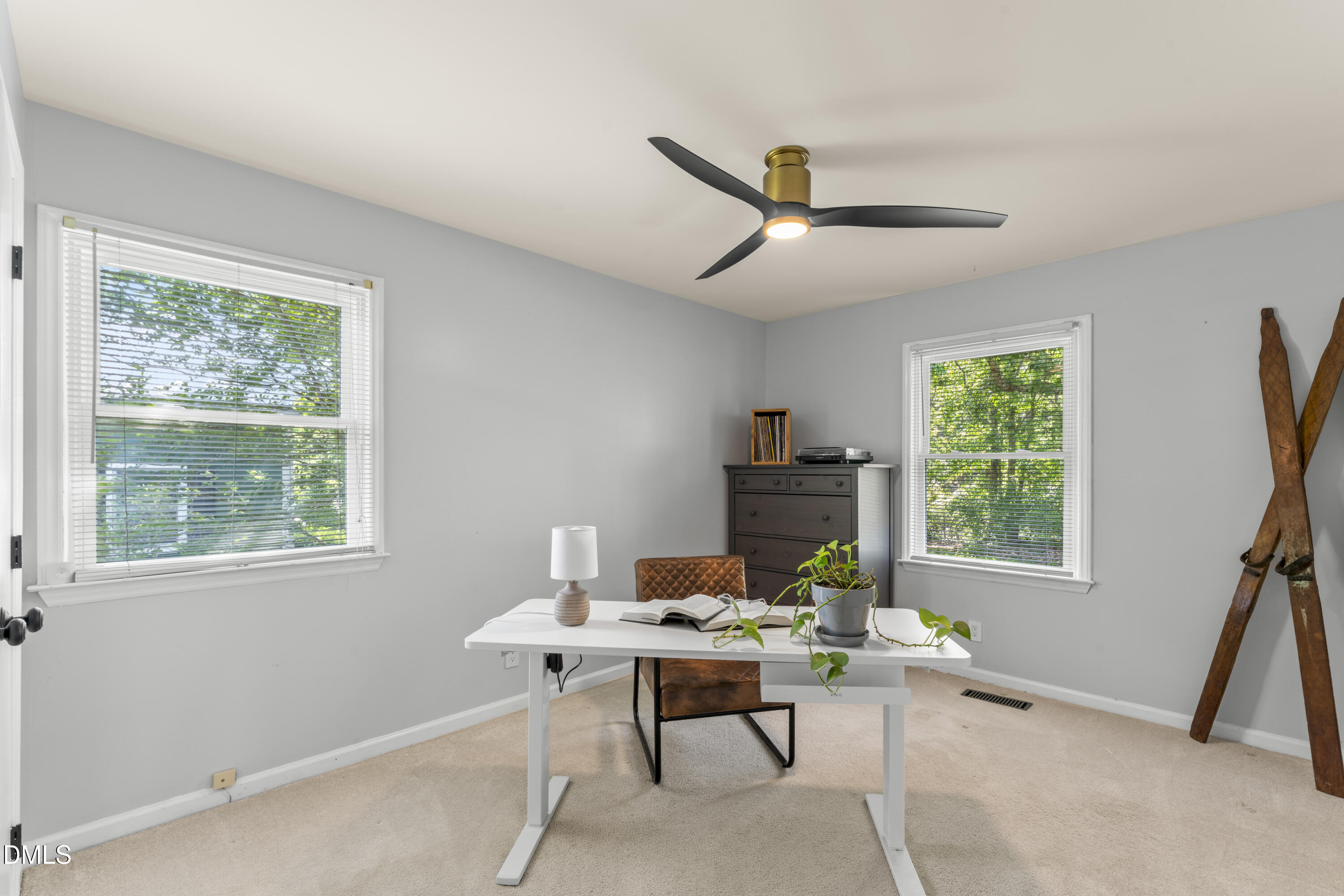 3419 Old Chapel Hill Road Durham, NC 27707 - Photo 25 of 38 a view of a workspace with furniture and a window