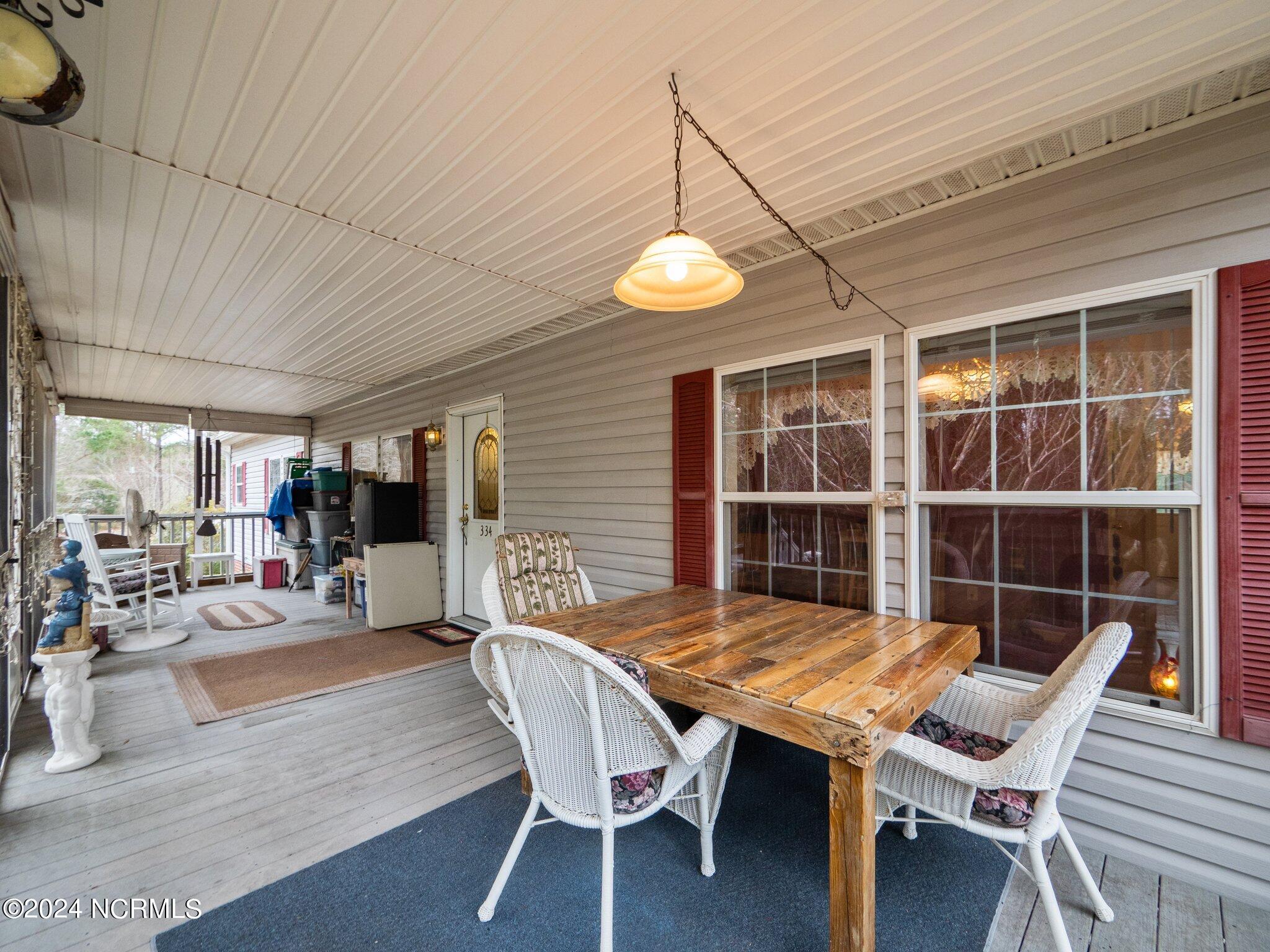 334 Old Folkstone Road Holly Ridge, NC 28445 - Photo 9 of 42 screened porch