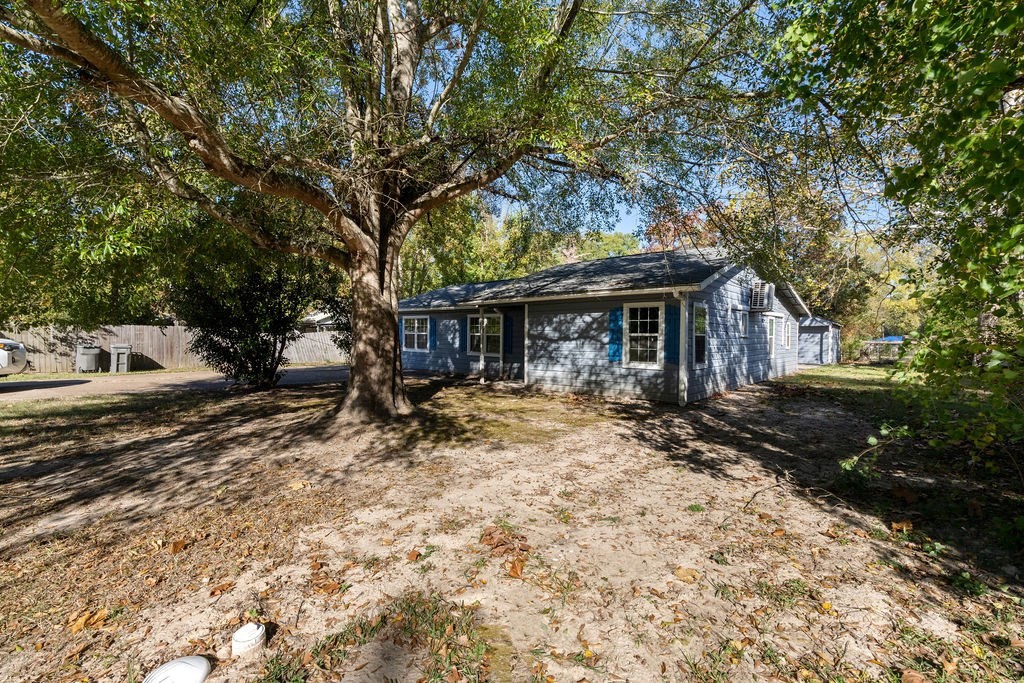 2915 Freeman Street Lufkin, TX 75901 - Photo 14 of 31 a view of house with backyard and tree