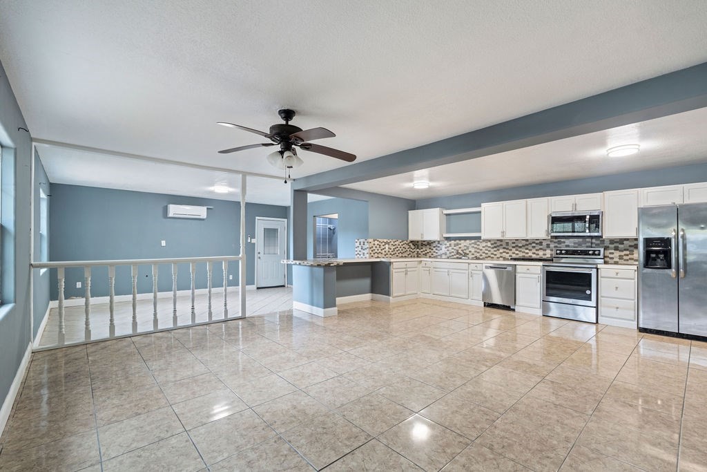 2915 Freeman Street Lufkin, TX 75901 - Photo 17 of 31 a view of kitchen with cabinets and stainless steel appliances