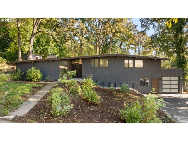 a black and white photo of a house