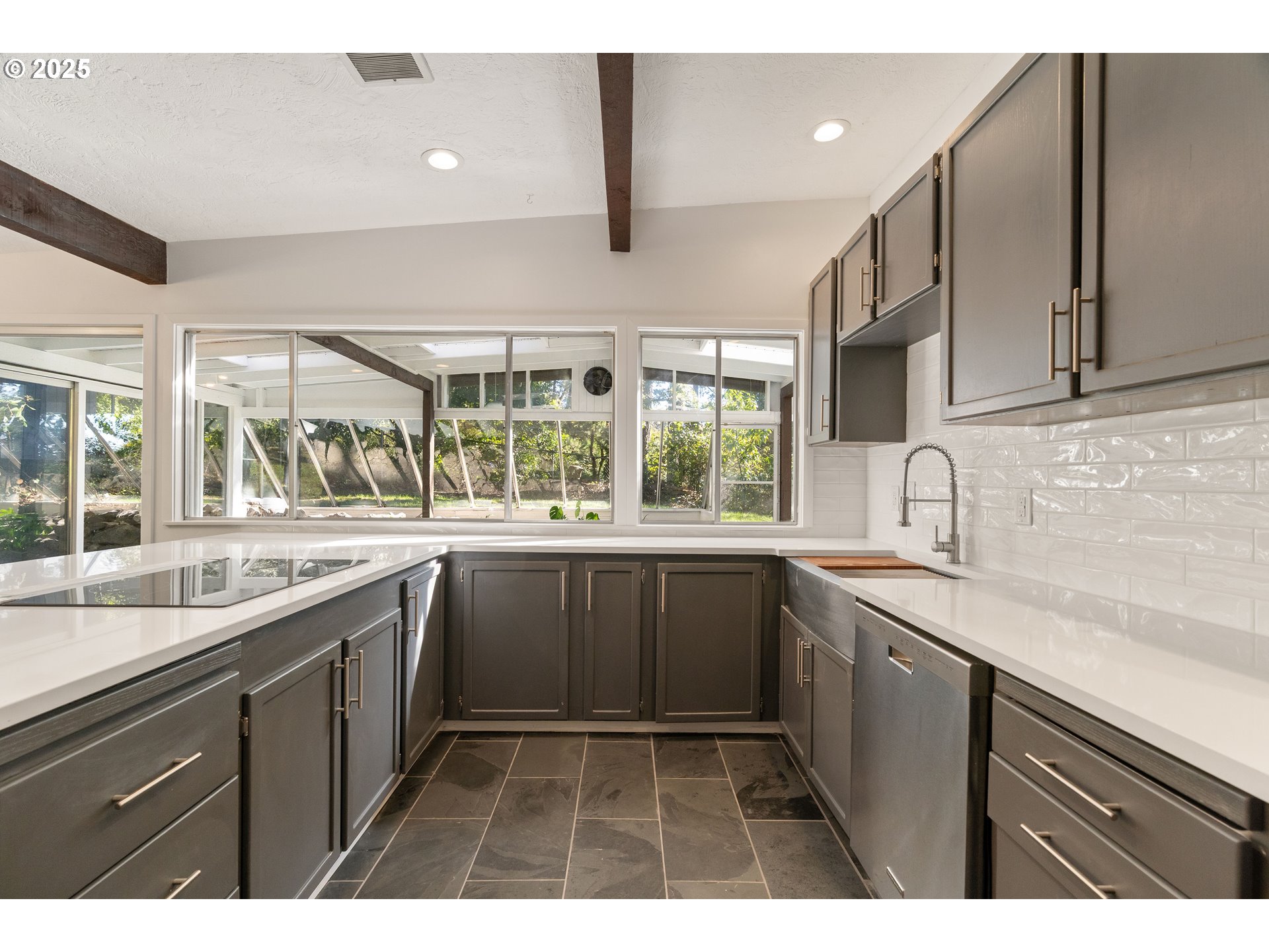 4778 Southeast Naef Road Milwaukie, OR 97267 - Photo 13 of 43 a kitchen with a sink and large window