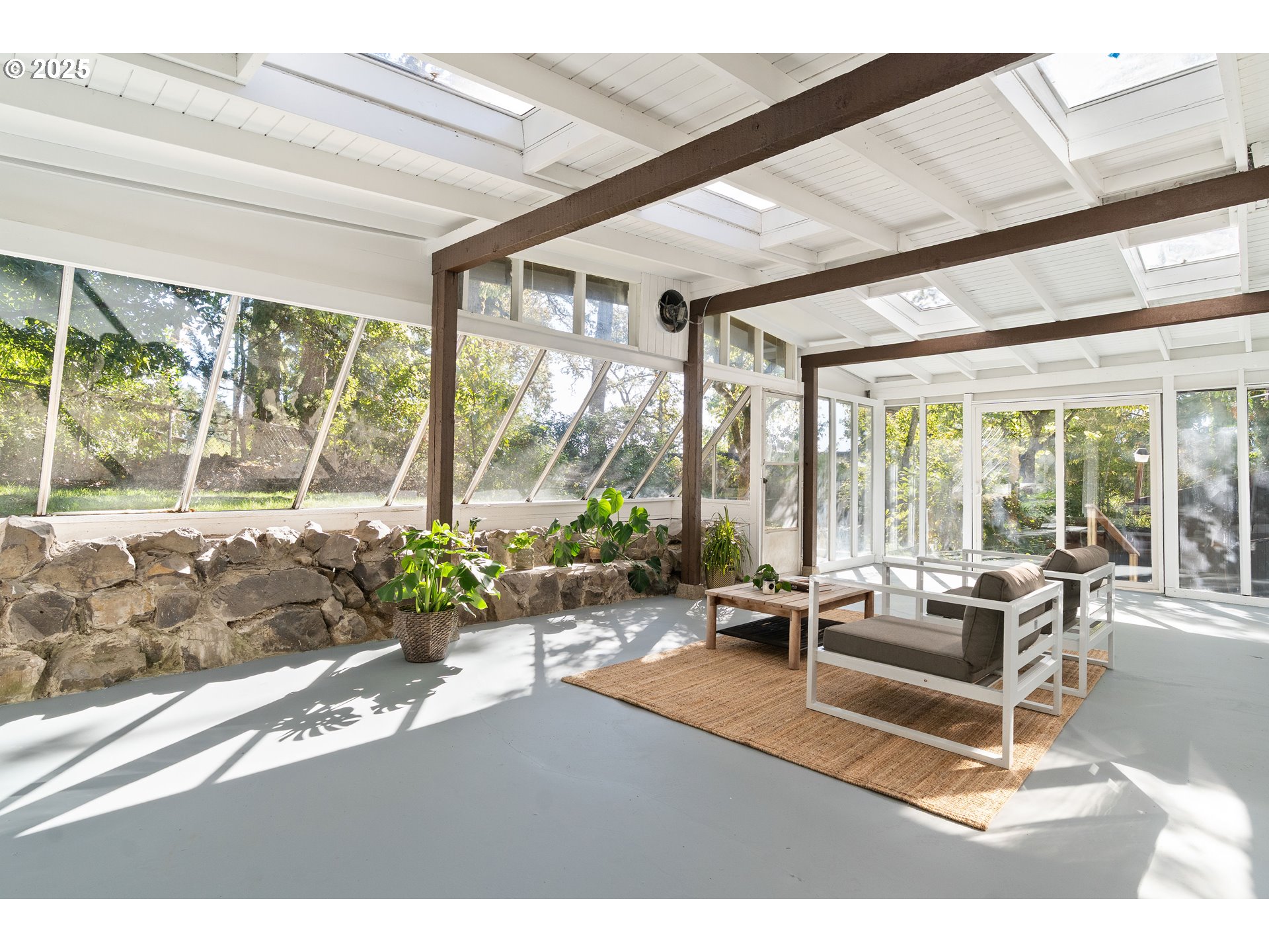 4778 Southeast Naef Road Milwaukie, OR 97267 - Photo 18 of 43 a living room with patio furniture and garden view
