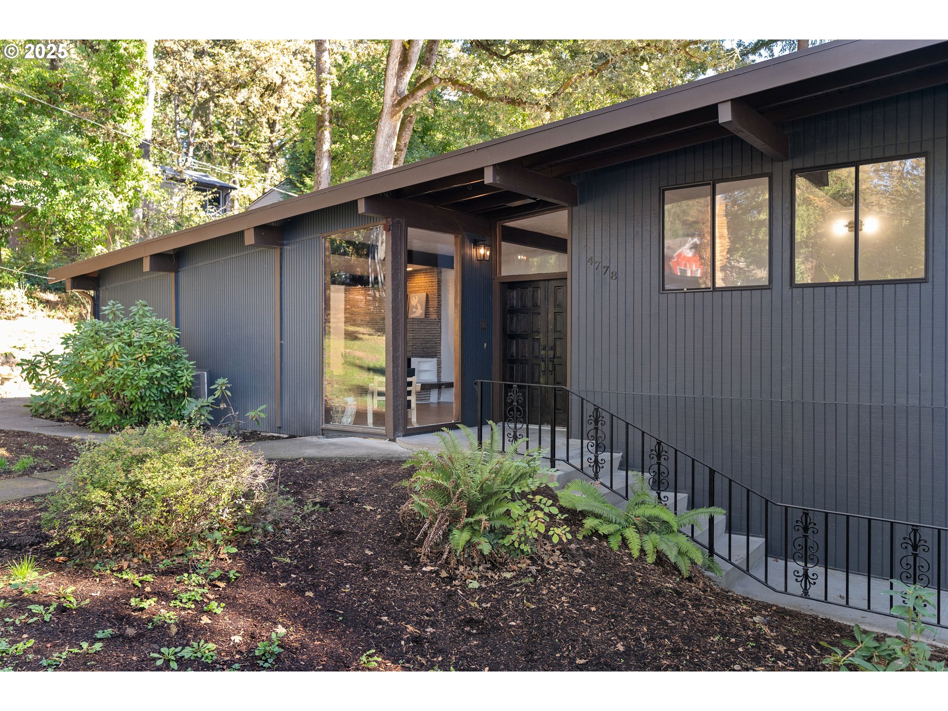 4778 Southeast Naef Road Milwaukie, OR 97267 - Photo 41 of 43 a view of a house with a yard