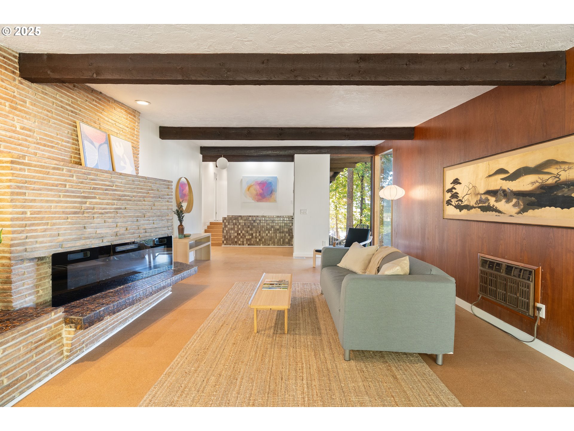 4778 Southeast Naef Road Milwaukie, OR 97267 - Photo 6 of 43 a living room with furniture and a fireplace