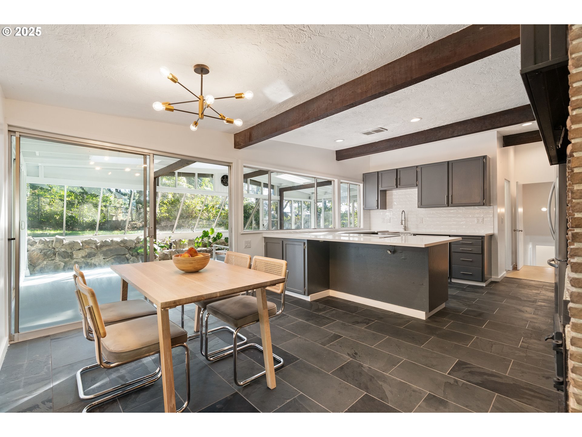 4778 Southeast Naef Road Milwaukie, OR 97267 - Photo 10 of 43 a view of a dining room with furniture window and outside view