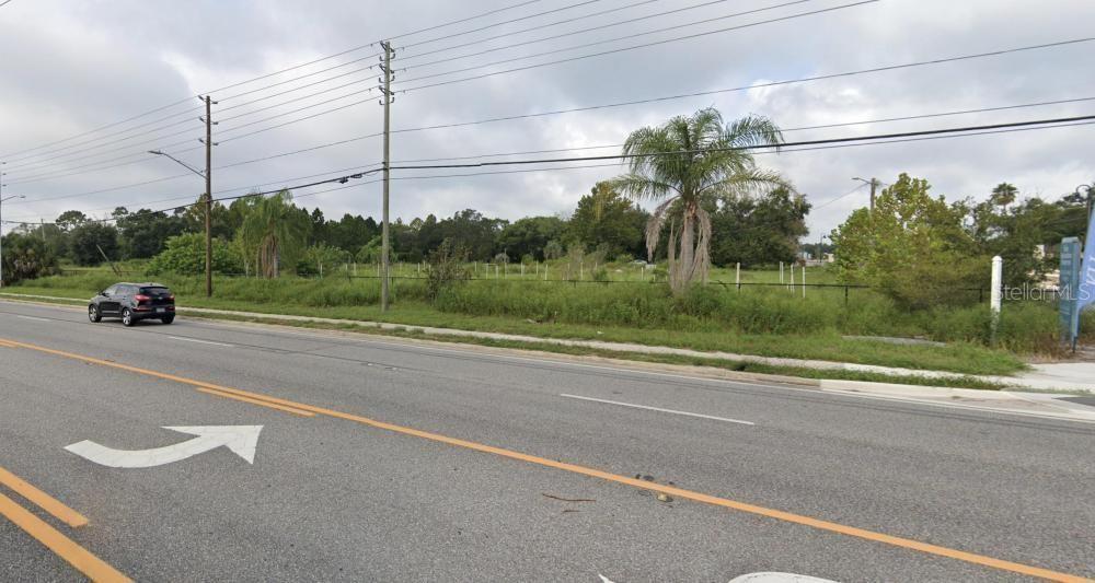 2104 Rock Springs Road Apopka, FL 32712 - Photo 6 of 9 a car parked on the side of the road