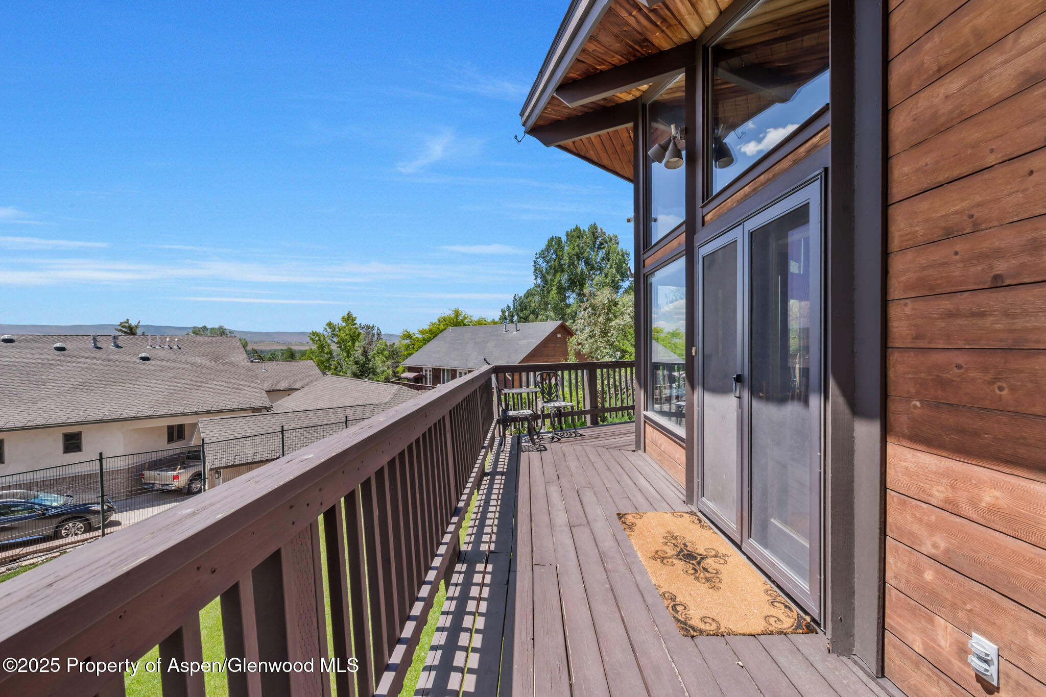 922 Steele Court Craig, CO 81625 - Photo 103 of 115 a view of balcony with wooden floor and seating space