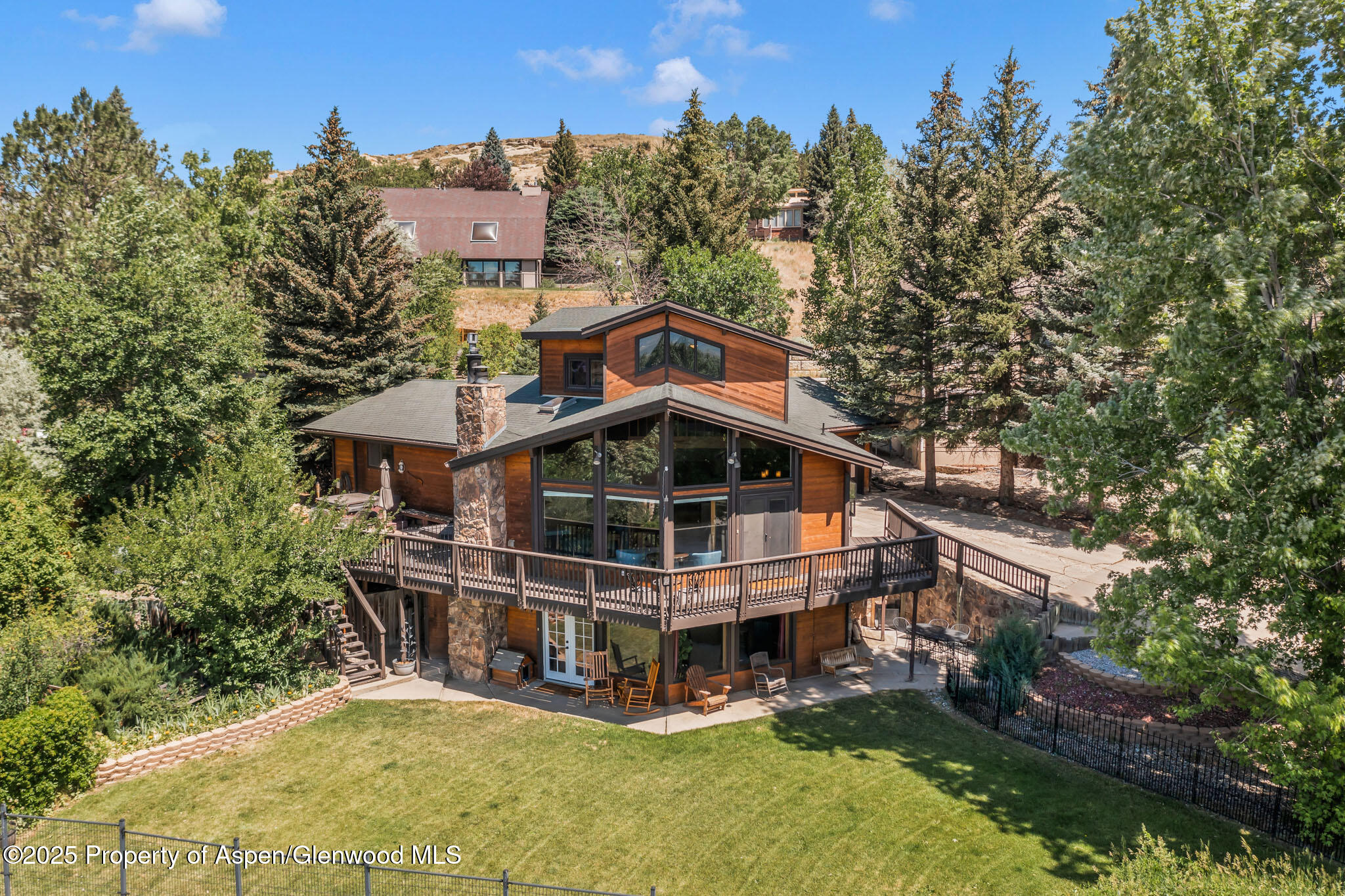 922 Steele Court Craig, CO 81625 - Photo 75 of 115 a view of a house with a big yard plants and large trees