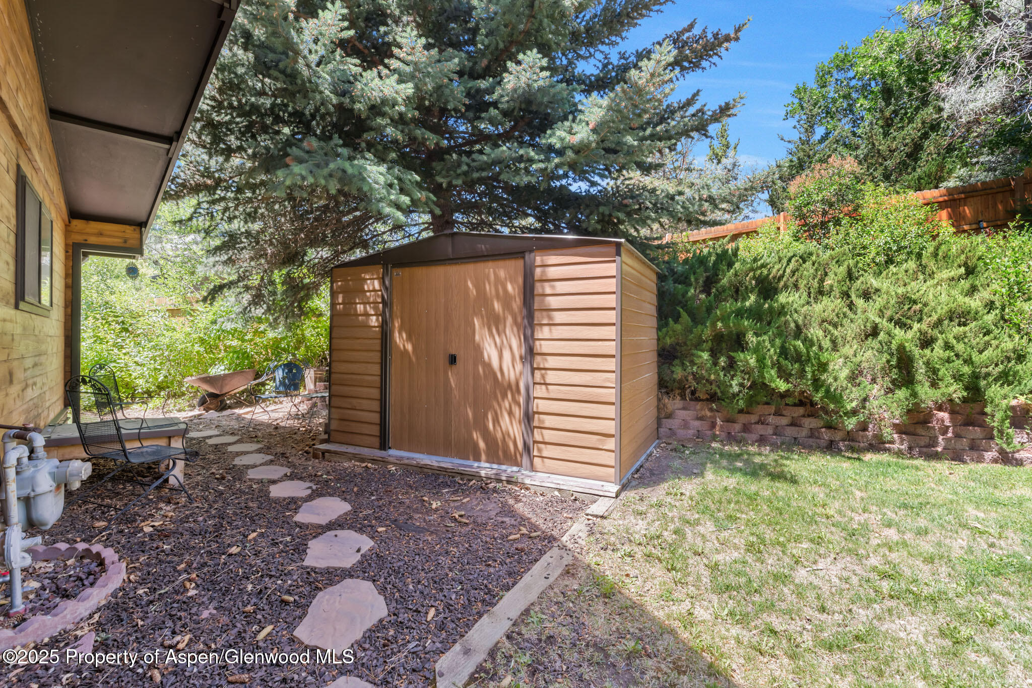 922 Steele Court Craig, CO 81625 - Photo 93 of 115 a backyard of a house with lots of green space