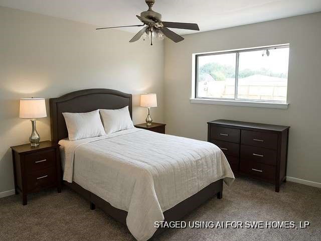 1200 Rugeley Street Bay City, TX 77414 - Photo 13 of 16 a bedroom with a bed and window