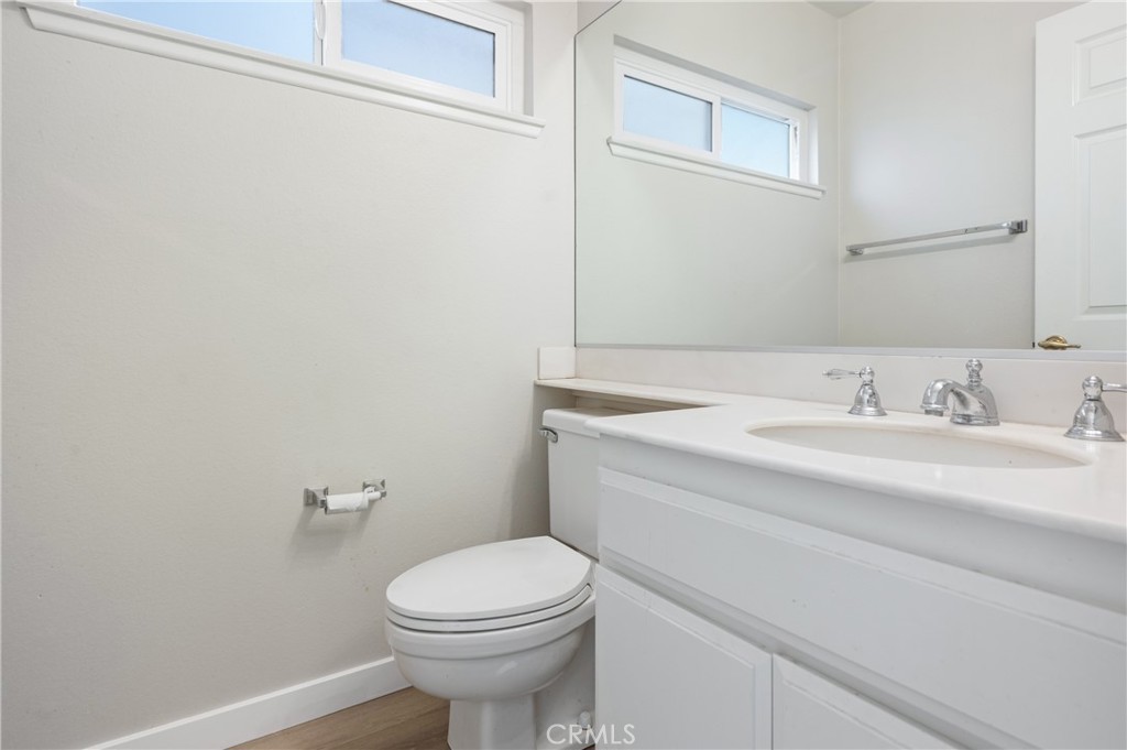 2 Glorieta East Irvine, CA 92620 - Photo 19 of 23 a bathroom with a sink and a toilet