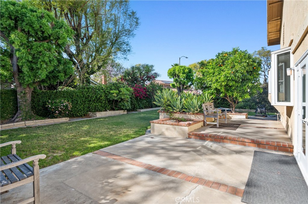 2 Glorieta East Irvine, CA 92620 - Photo 20 of 23 a view of a backyard with plants and a patio