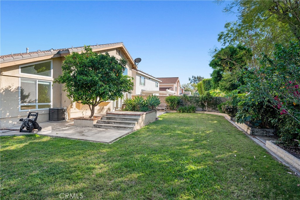 2 Glorieta East Irvine, CA 92620 - Photo 21 of 23 a front view of a house with garden