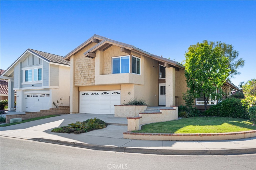 2 Glorieta East Irvine, CA 92620 - Photo 23 of 23 a front view of a house with a yard