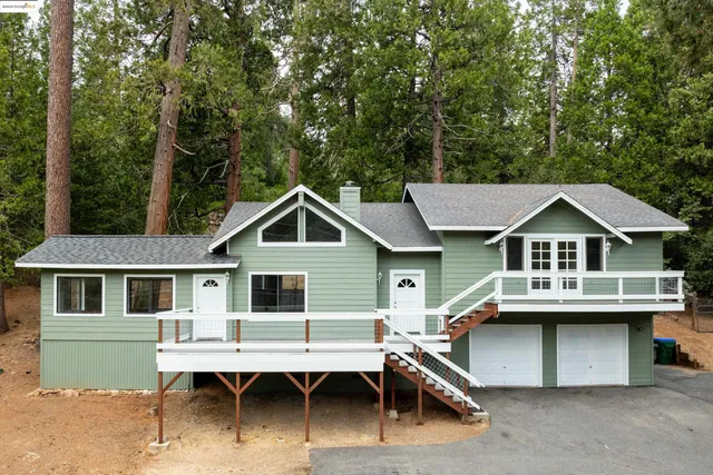 a house view with a outdoor space