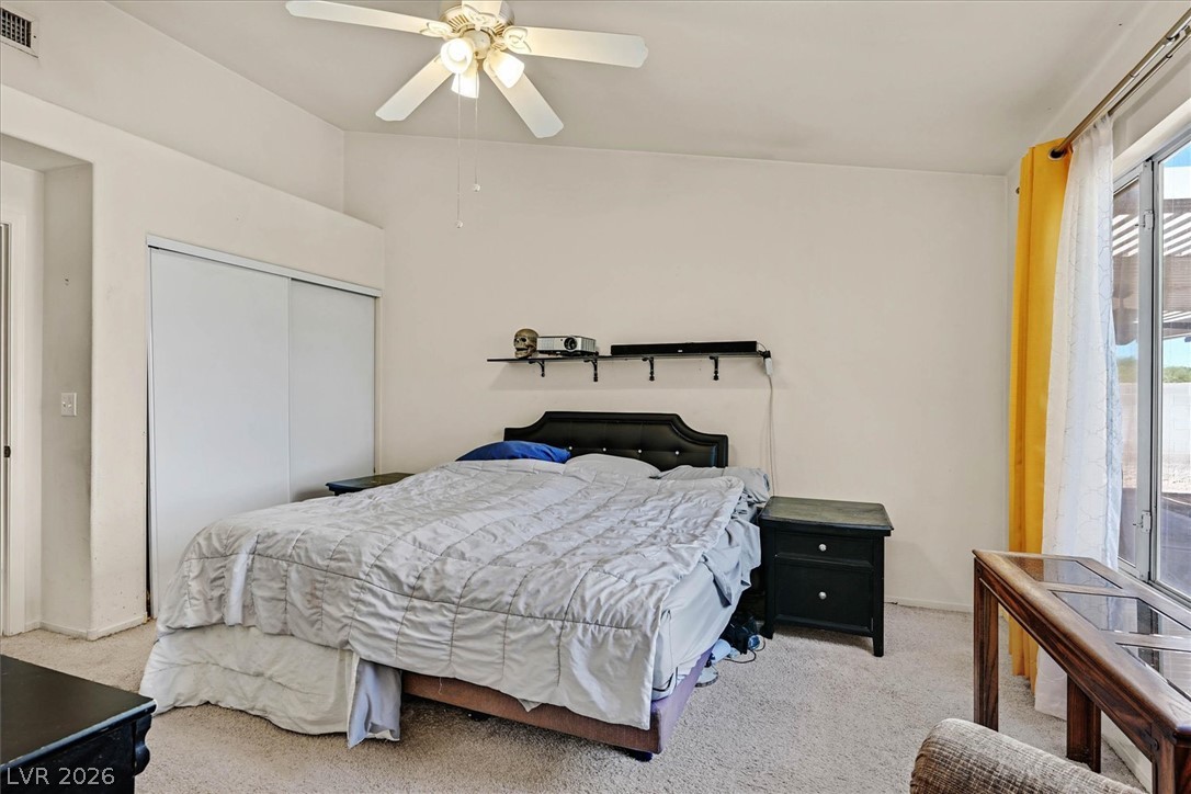 8830 Haviland Road Las Vegas, NV 89123 - Photo 16 of 43 High ceilings and soft carpeting create a comfortable atmosphere in this private retreat.
