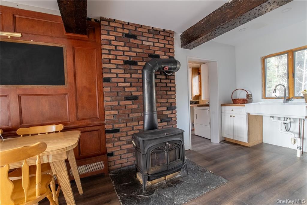 71 Kawlija Road Grahamsville, NY 12740 - Photo 5 of 16 a kitchen with a stove and a microwave