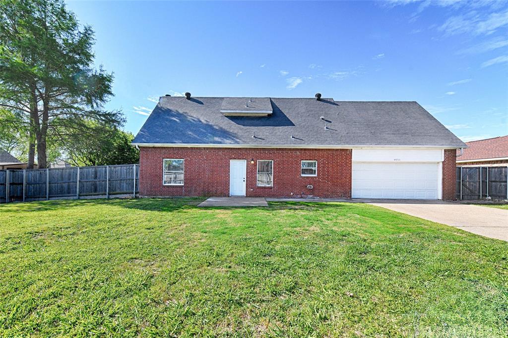 4805 Hunters Ridge Drive Sachse, TX 75048 - Photo 19 of 24 a view of a backyard with barn