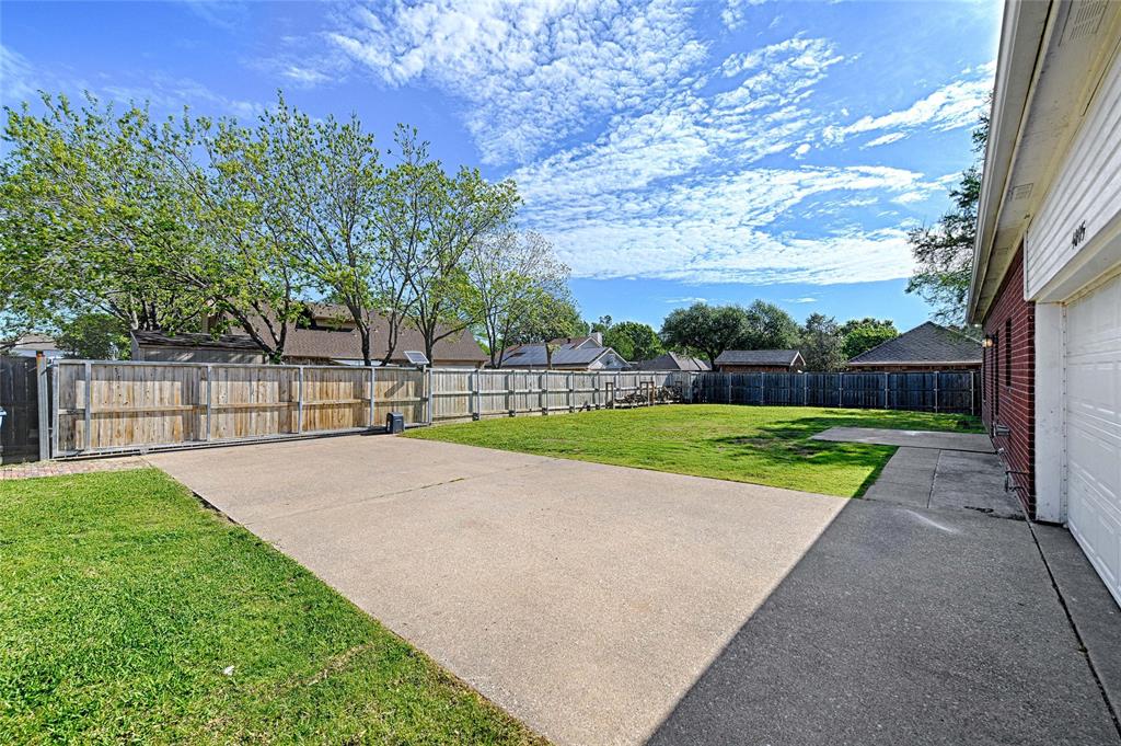 4805 Hunters Ridge Drive Sachse, TX 75048 - Photo 20 of 24 a view of a park with large trees