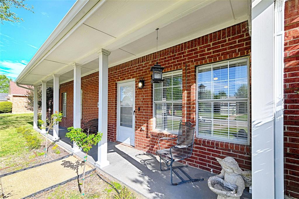 4805 Hunters Ridge Drive Sachse, TX 75048 - Photo 2 of 24 a view of house with outdoor seating
