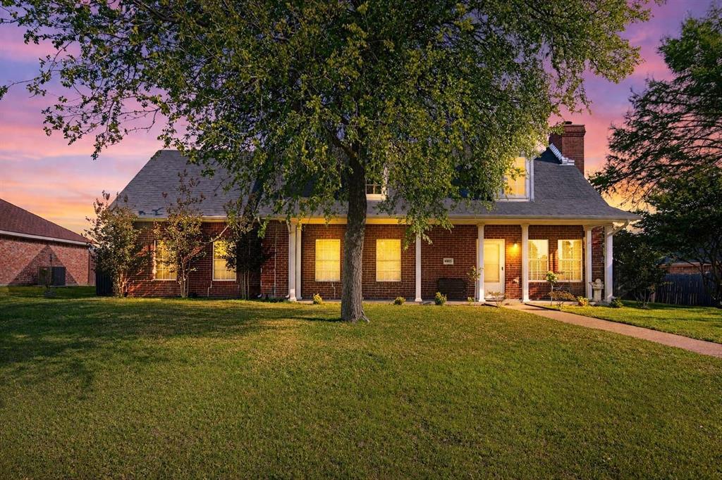 4805 Hunters Ridge Drive Sachse, TX 75048 - Photo 5 of 24 a large building with trees in front of it