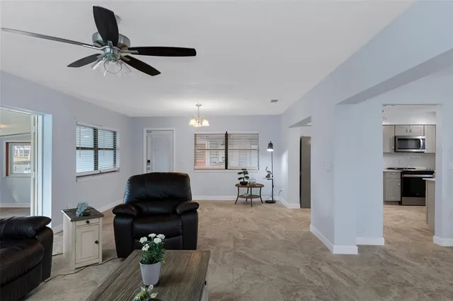 a living room with furniture and a window