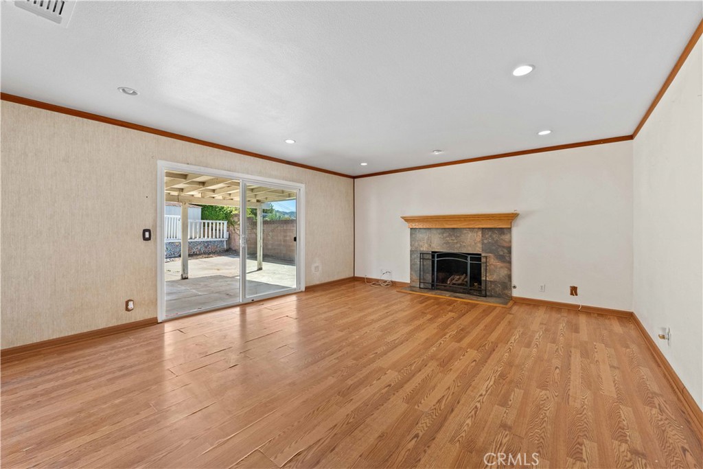 6664 Tapley Street Simi Valley, CA 93063 - Photo 8 of 31 Living room with dual pane glass slider & recessed lighting.