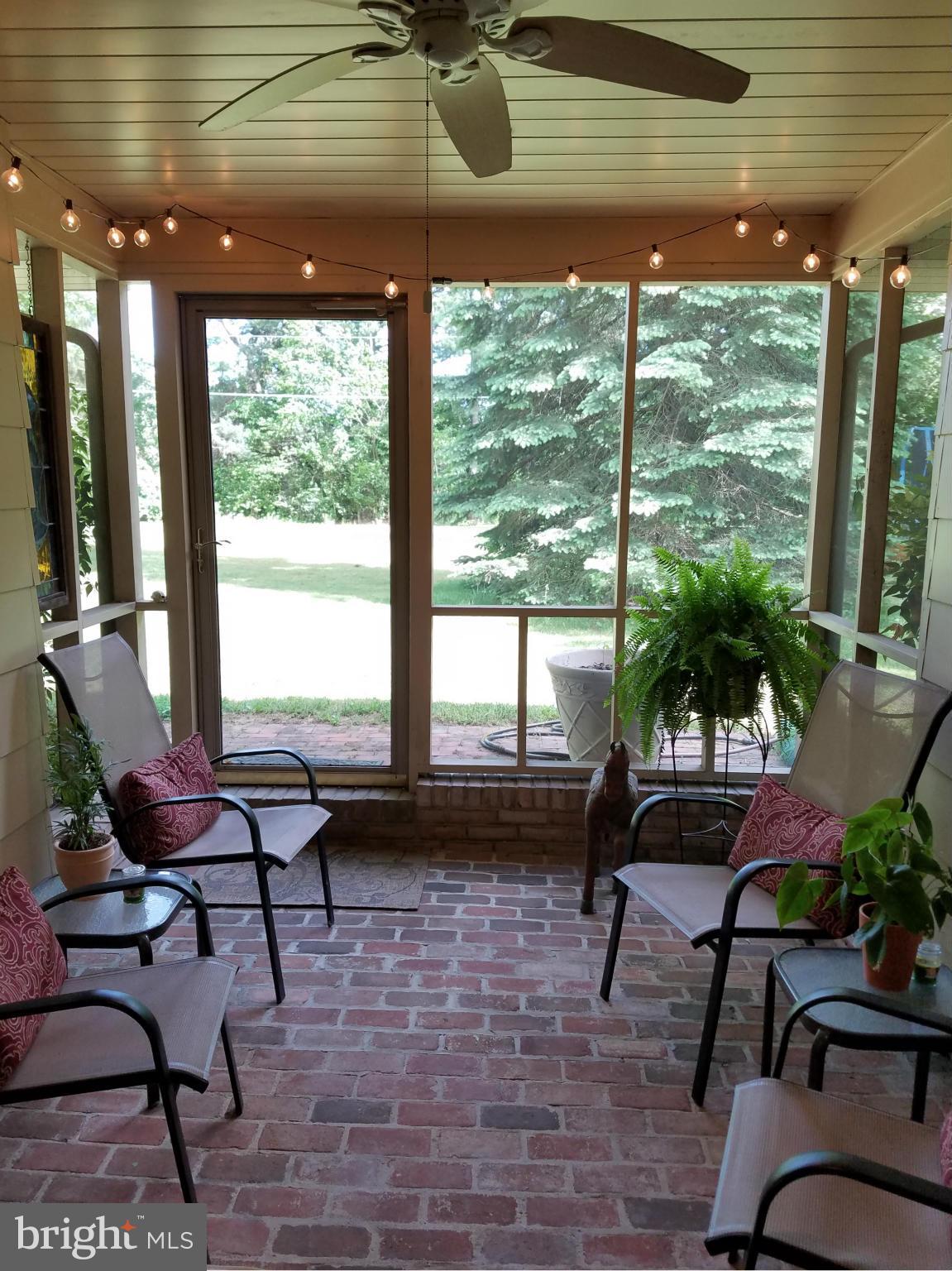 7925 Edgewood Farm Road Frederick, MD 21702 - Photo 22 of 30 Sunroom with brick flooring