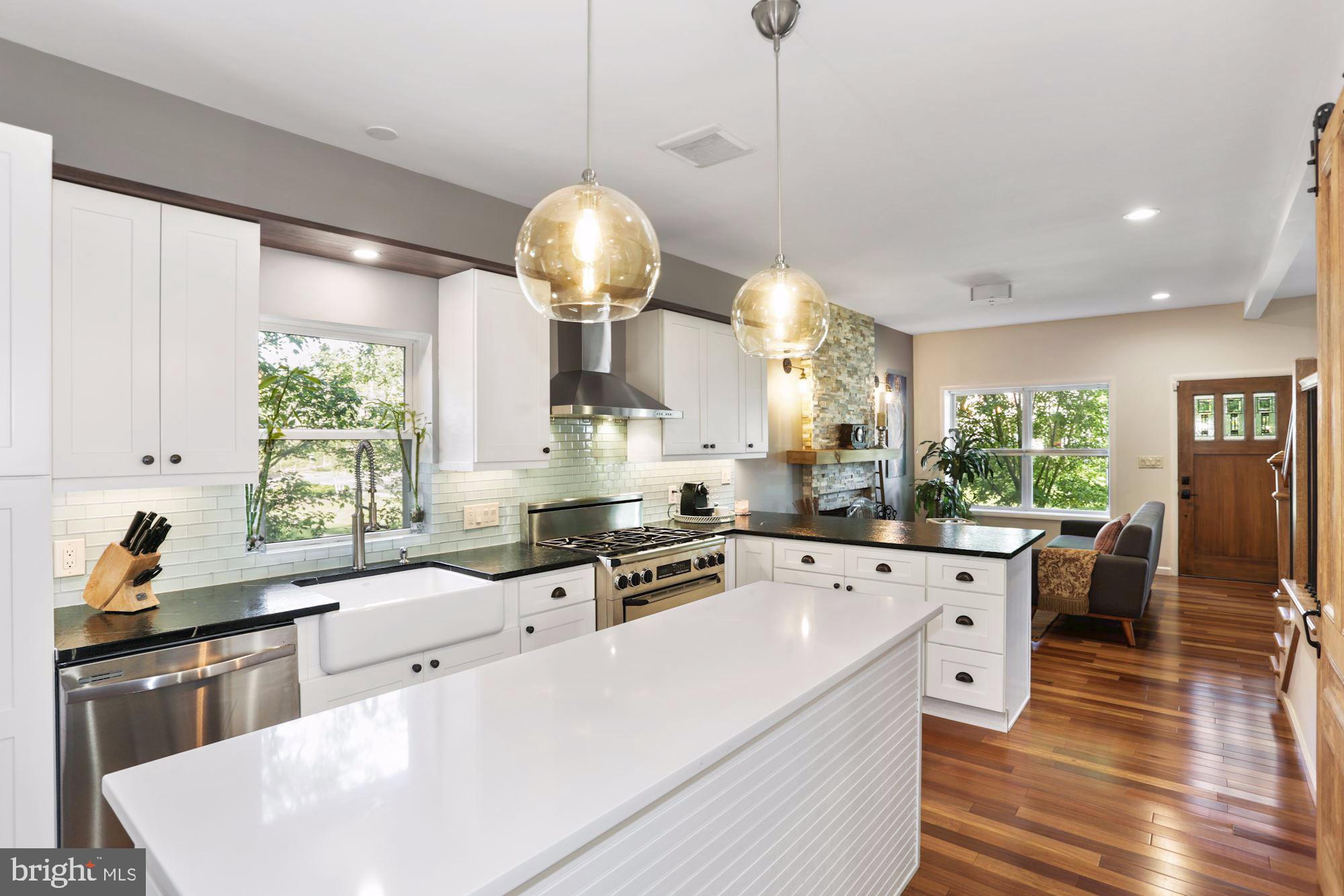 203 Tapawingo Road Southeast Vienna, VA 22180 - Photo 13 of 33 Quartz Kitchen island, perfect for entertaining.